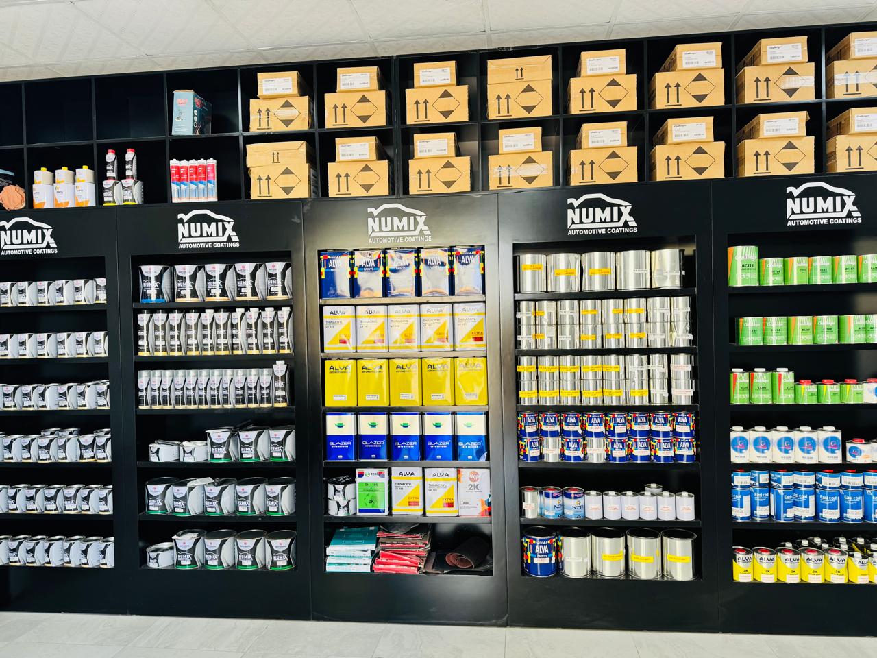 Automotive paint retail shelving with professional refinish products